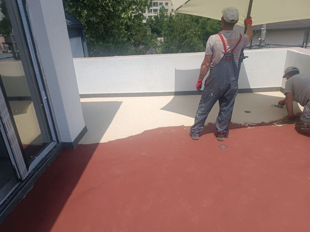 Proiect Rahova-Ferentari – hidroizolație terasă circulabilă cu covor de piatră naturală, fotografia 11