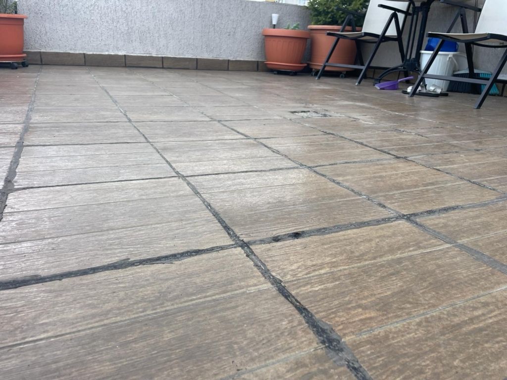 Proiect Grivita – hidroizolație terasă circulabilă cu covor de piatră naturală, fotografia 8
